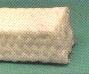PTFE packing treated with an inert lubricant
