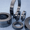 Die formed graphite rings,